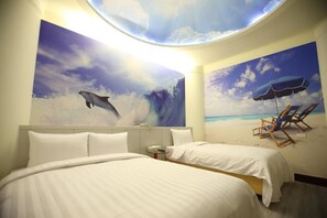 A hotel room with two beds, a ceiling mural of a dolphin and a beach scene, and a view of the ocean through a skylight. - Anshun Hotel (Taichung)
