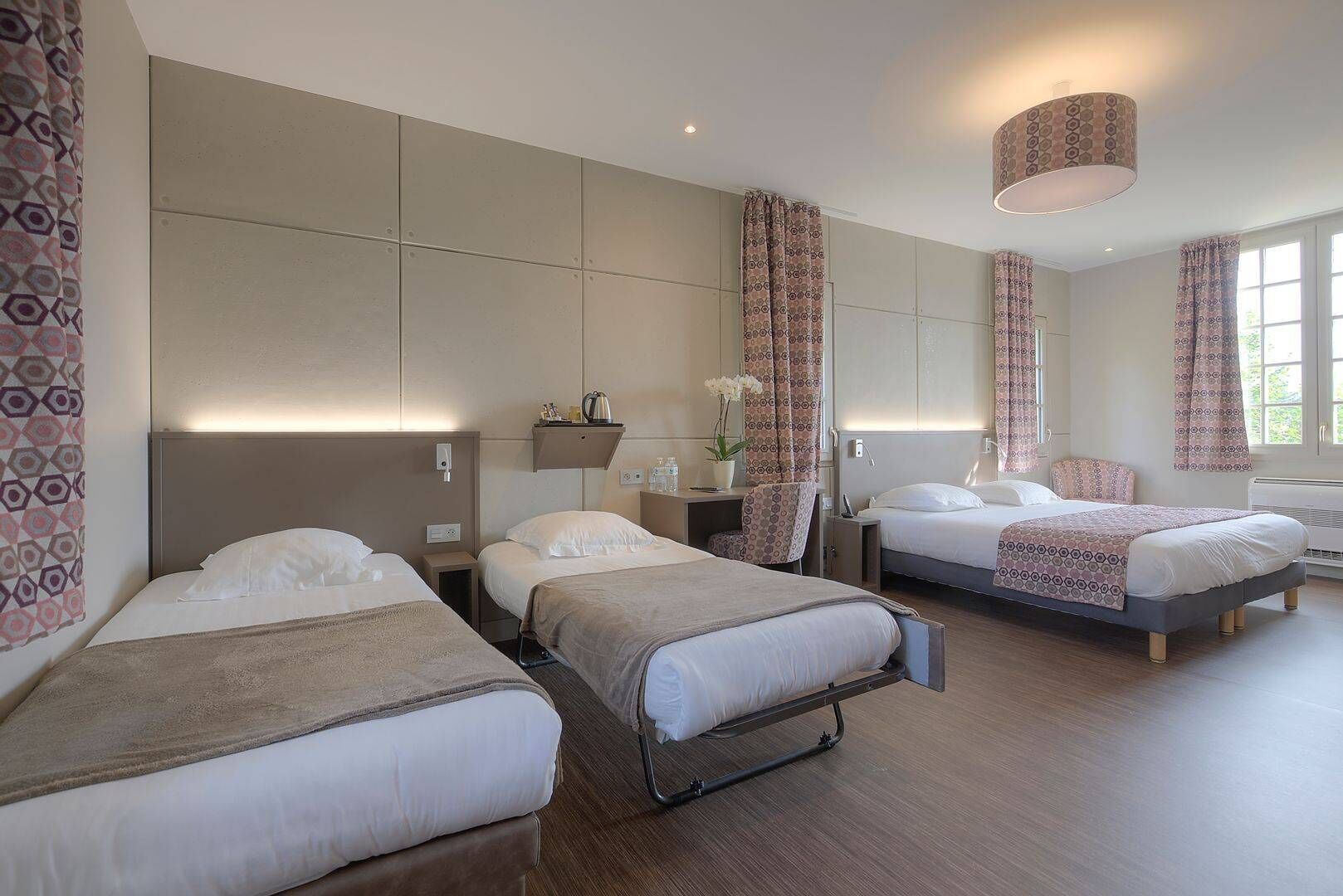 premium room triple or quadruple (contemporary) | 1 bedroom, desk, soundproofing, iron/ironing board