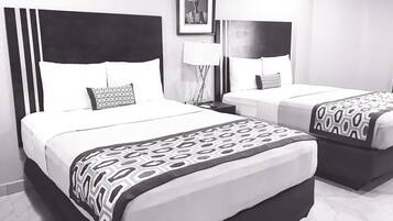 Habitación Deluxe con 2 camas individuales | Ropa de cama de alta calidad, escritorio, wifi gratis