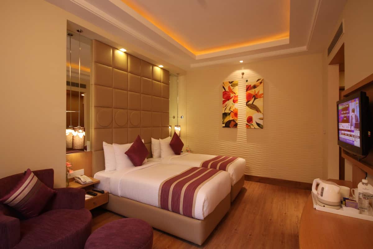 Deluxe Double Room, 1 Double Bed, Pool View | Minibar, in-room safe, desk, iron/ironing board