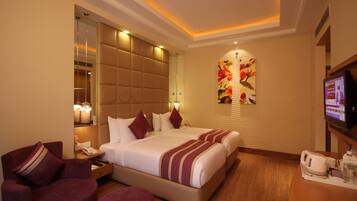 Deluxe Double Room, 1 Double Bed, Pool View | Minibar, in-room safe, desk, iron/ironing board