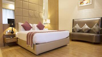 Deluxe Double Room, 1 Double Bed, Pool View | Minibar, in-room safe, desk, iron/ironing board