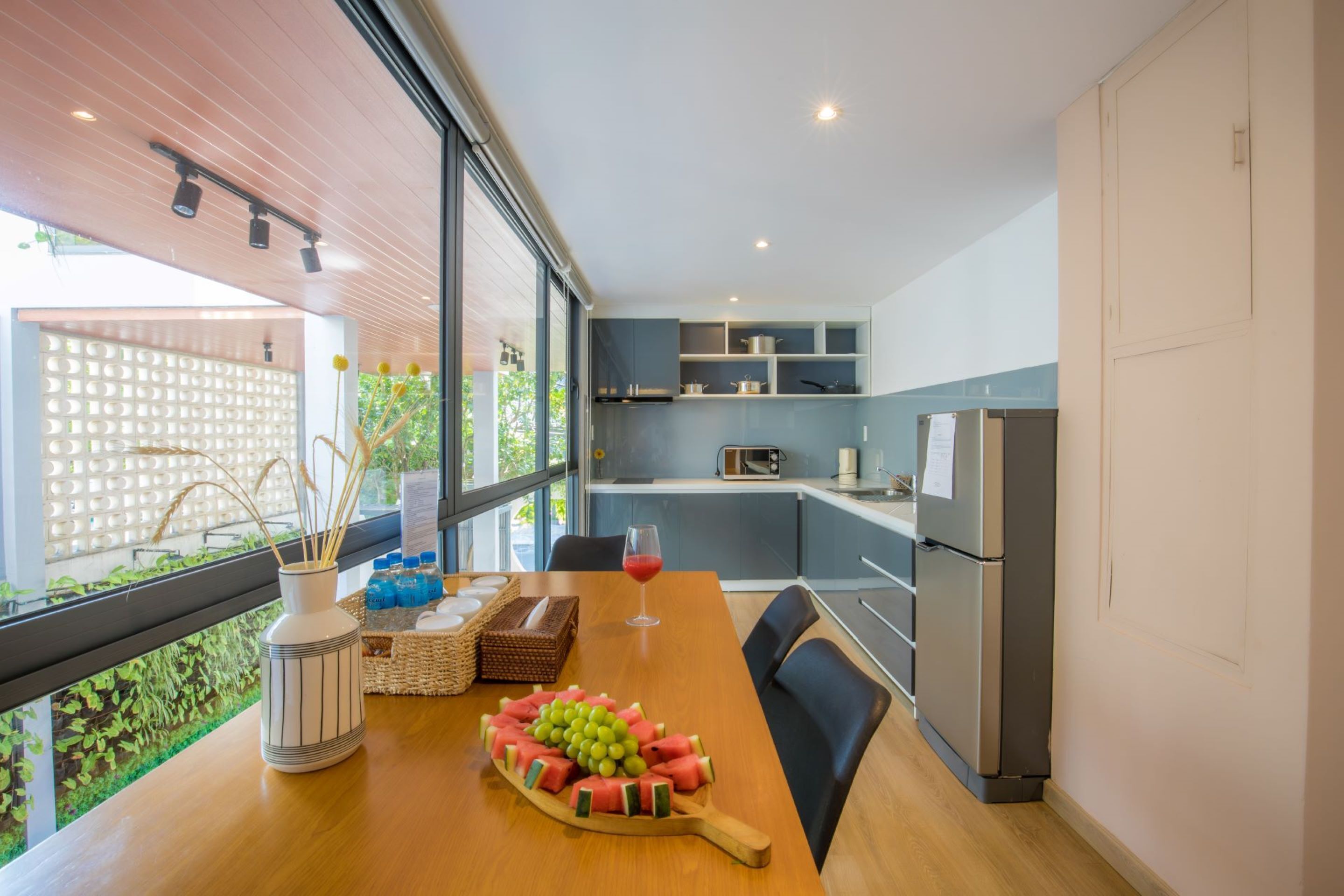 full-sized fridge, microwave, electric kettle, paper towels