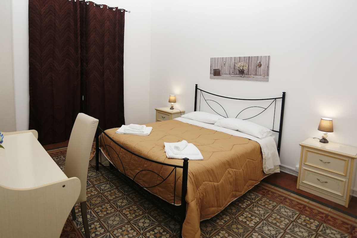 Economy Double Room, Private Bathroom (External) | Desk, free WiFi, bed sheets