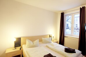 Apartamento, terraza | Sistema de insonorización, Internet por cable gratuito, ropa de cama