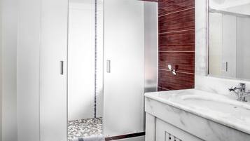 Shower, free toiletries, hair dryer, slippers