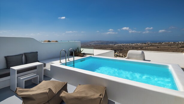 A rooftop pool with a clear view of the landscape.