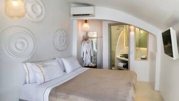 Frette Italian sheets, premium bedding, Tempur-Pedic beds, minibar