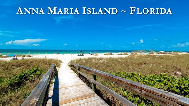A wooden boardwalk leading to a beach with clear blue water and a clear sky. - Coastal Condo, Heated Pool Steps from the Beach (Holmes Beach)