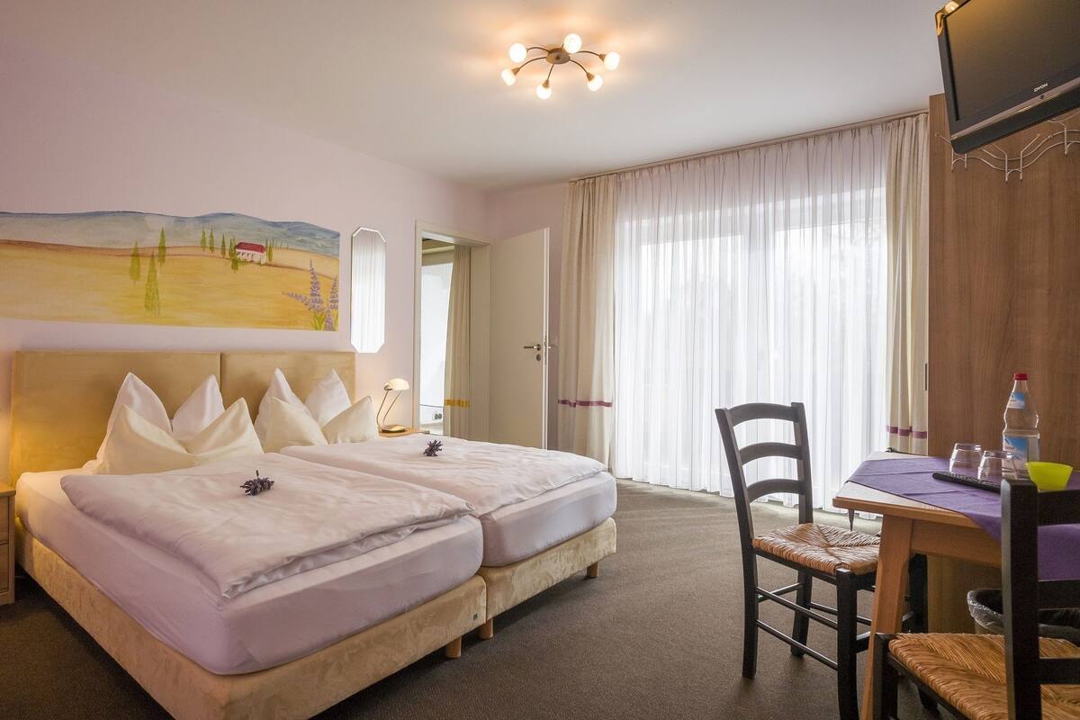 Family Room | Hypo-allergenic bedding, minibar, in-room safe, desk