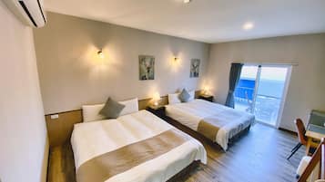 Premium bedding, down comforters, pillowtop beds, minibar