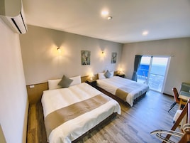 Premium bedding, down comforters, pillowtop beds, minibar