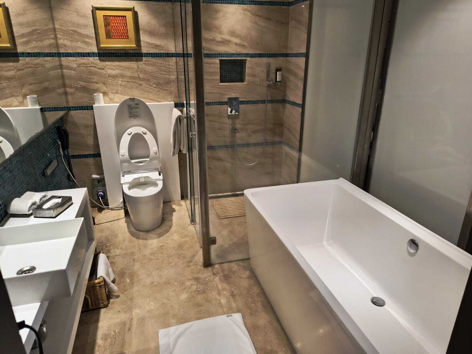 presidential suite | bathroom | shower, free toiletries, hair dryer, towels