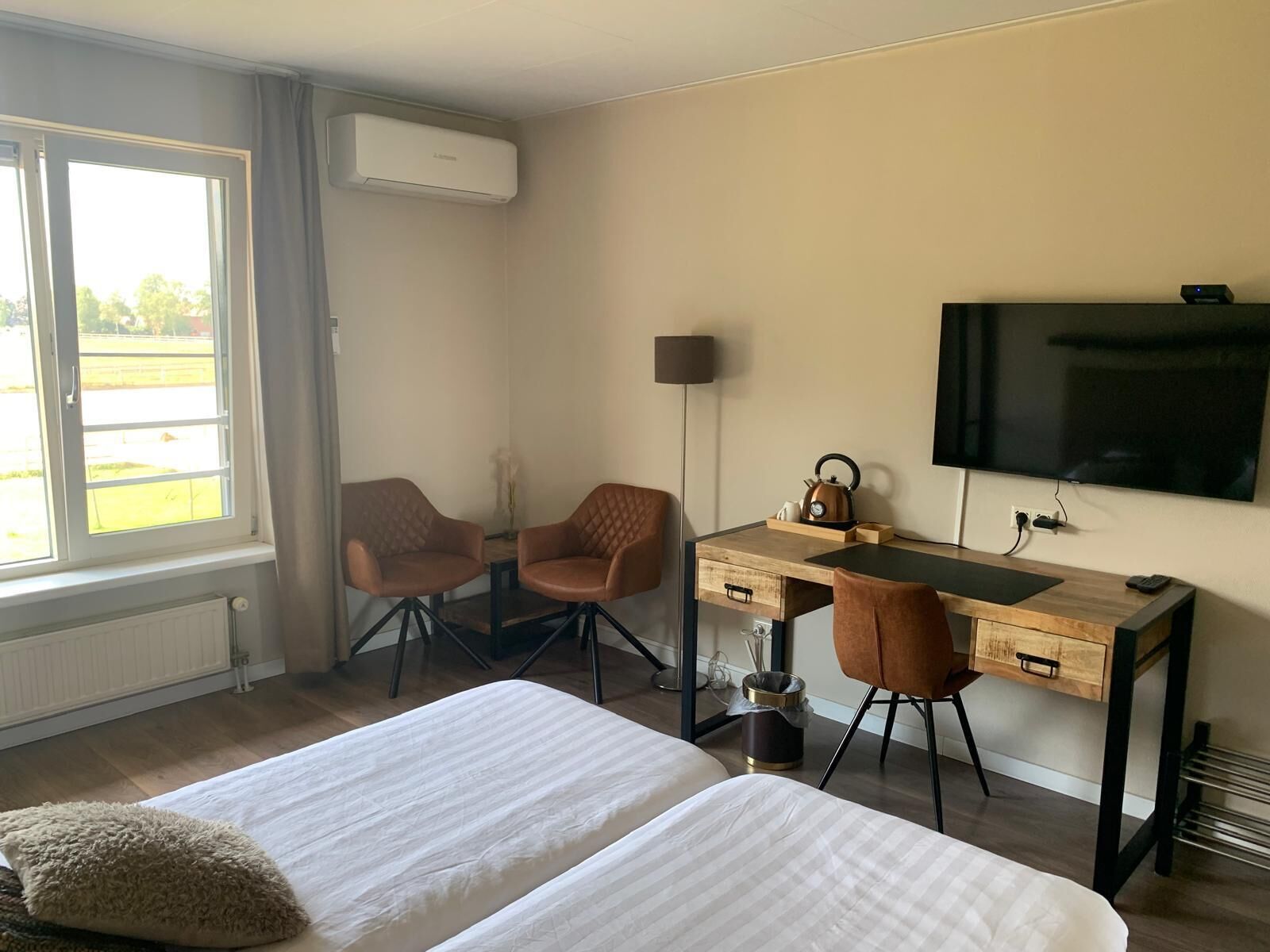 Comfort-Doppelzimmer, Gartenblick | Schreibtisch, laptopgeeigneter Arbeitsplatz, kostenlose Babybetten