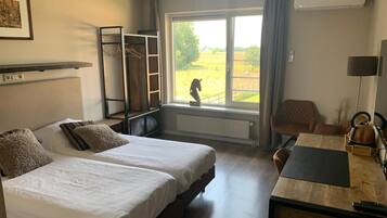 Desk, laptop workspace, free cots/infant beds, rollaway beds