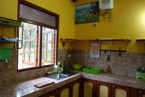 Classic Double Room, Garden View, Garden Area | Living area | Flat-screen TV - Manel Guesthouse (Galle)