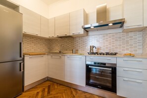 Apartment, 2 Bedrooms | Private kitchenette | Full-sized fridge, oven, stovetop, coffee/tea maker - Padova Tower City View Bora (Padova)