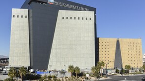 The World Market Center building with a prominent glass facade and a distinctive angular design. - Desert Moon Motel (Las Vegas)