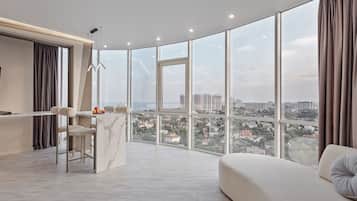 Panoramic Condo | Living area | 43-inch flat-screen TV with cable channels, TV