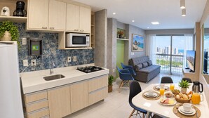 Premium Apartment | Private kitchen | Fridge, cookware/dishes/utensils, dining tables - Beach Class Fortaleza Praia de Iracema (Fortaleza)
