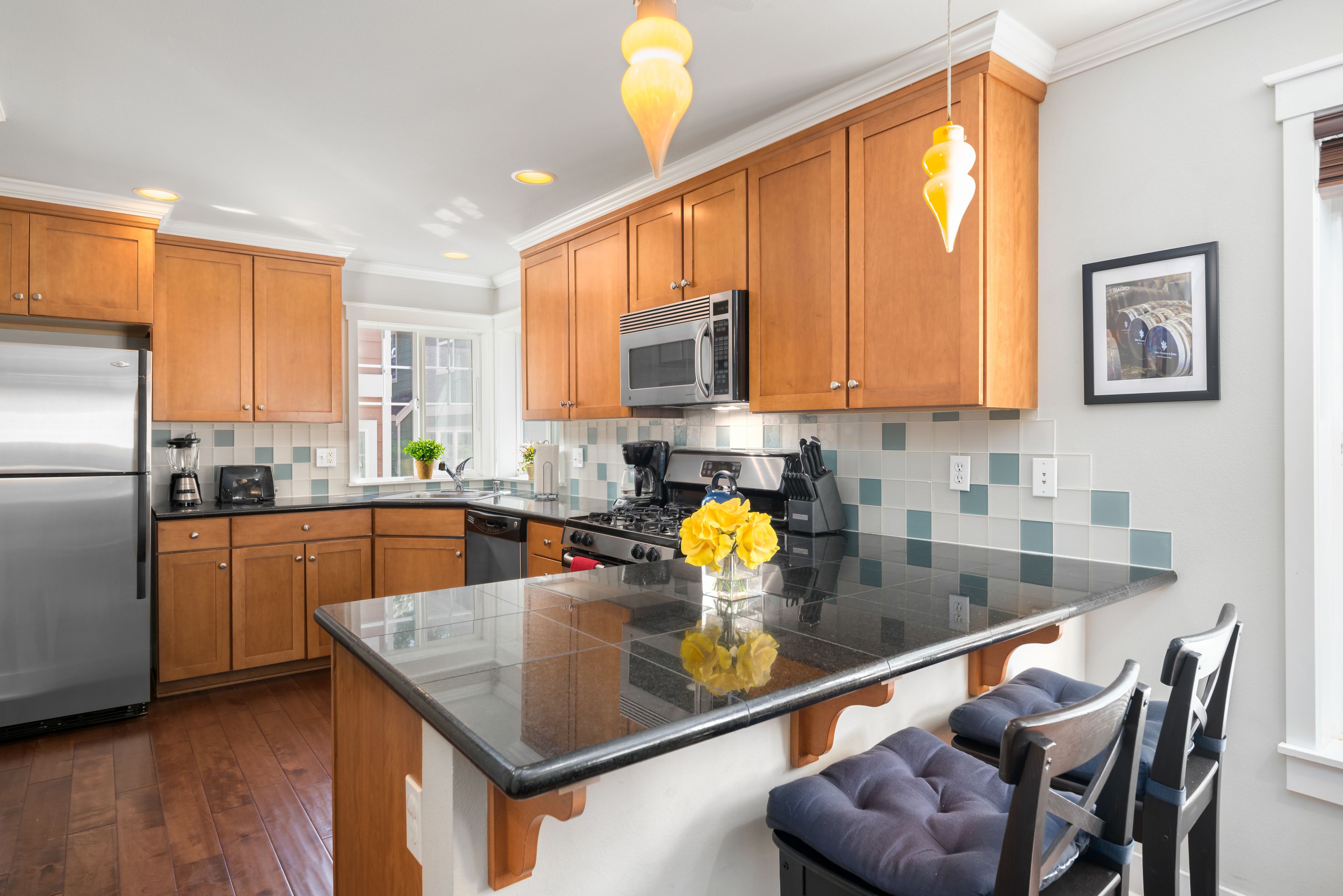 Deluxe Townhome, 3 Bedrooms, Kitchen | Living area | 50-inch flat-screen TV with satellite channels, TV, fireplace