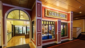 A General Store with a glass front, wooden flooring, and a sign above the entrance. - Red Garter Hotel & Casino by Red Lion Hotels (West Wendover)