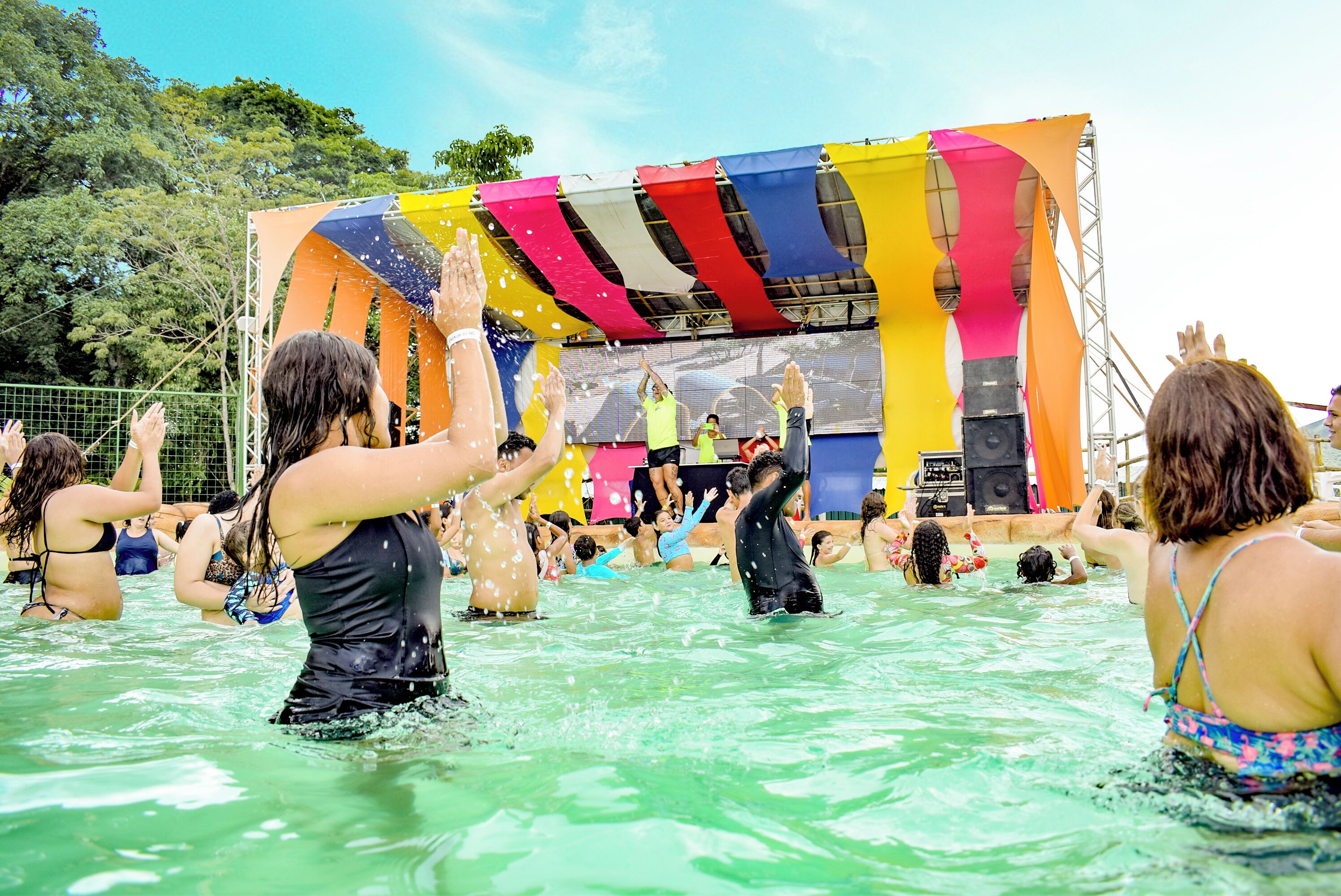 A water park with a stage and colorful decorations.