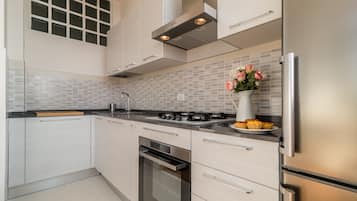 Apartment, 1 Bedroom | Private kitchenette | Full-size fridge, coffee/tea maker