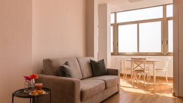 Apartment, 1 Bedroom | Living area | Flat-screen TV