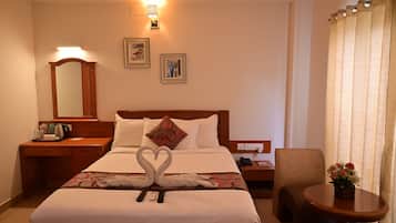 Classic Room | 1 bedroom, premium bedding, minibar, in-room safe