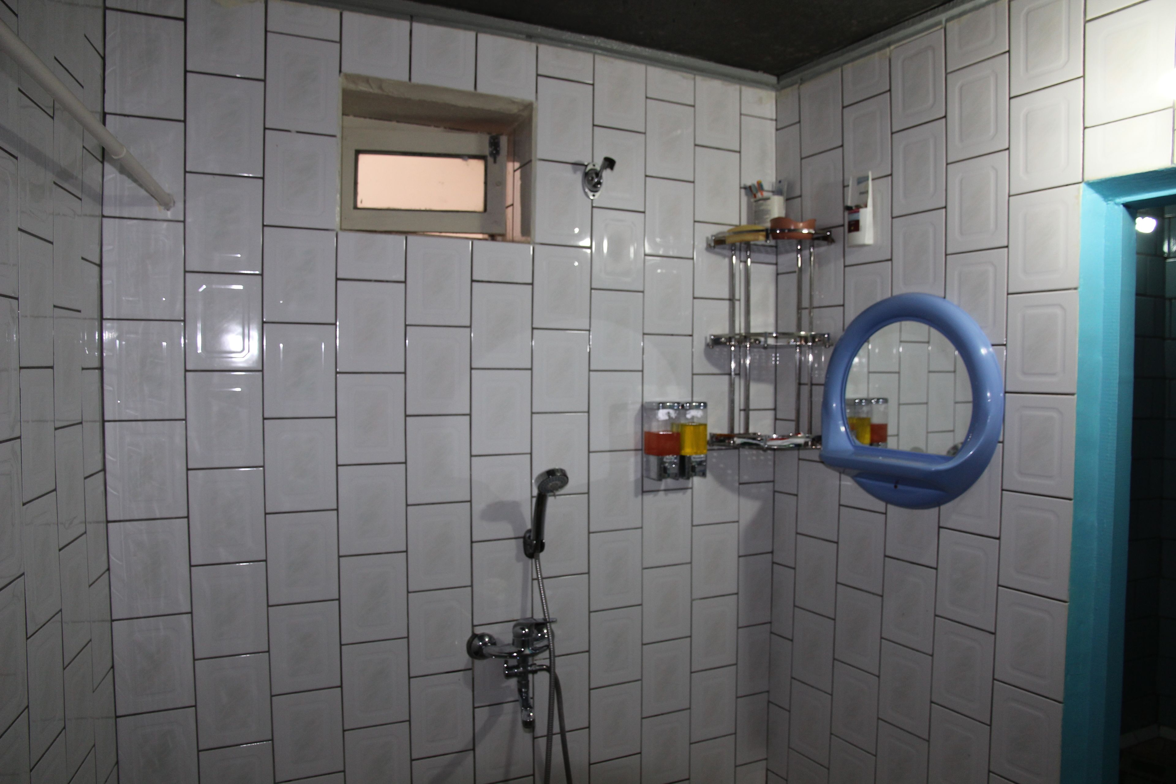 Shower, free toiletries, hair dryer, slippers