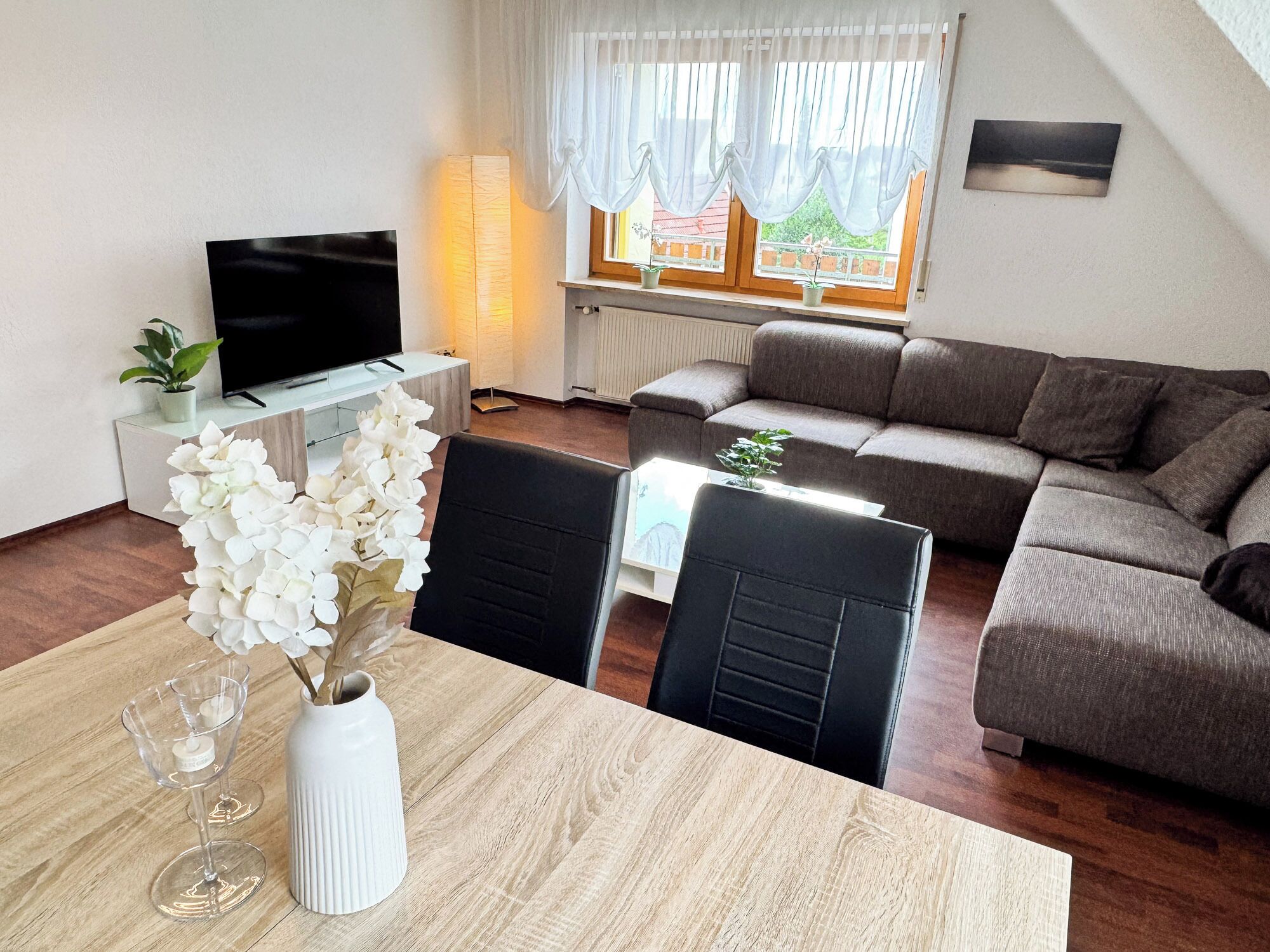 Apartment, 2 Bedrooms, Balcony | Living area | 50-inch Smart TV with satellite channels, video game console