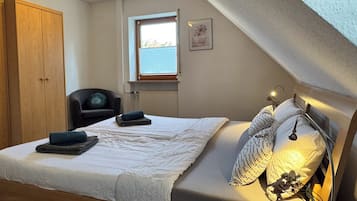 Apartment, 2 Bedrooms, Balcony | 2 bedrooms, desk, laptop workspace, iron/ironing board