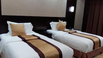 Ropa de cama de alta calidad y minibar