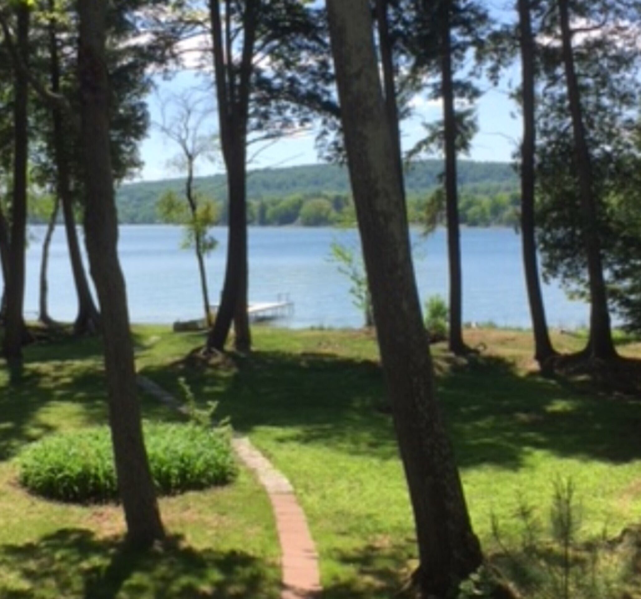 Big Platte Lake-100’ shoreline with dock & beach! Book your 2025 summer now!