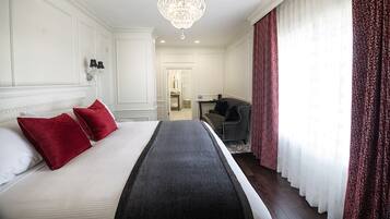 Premium bedding, down comforters, in-room safe, individually decorated