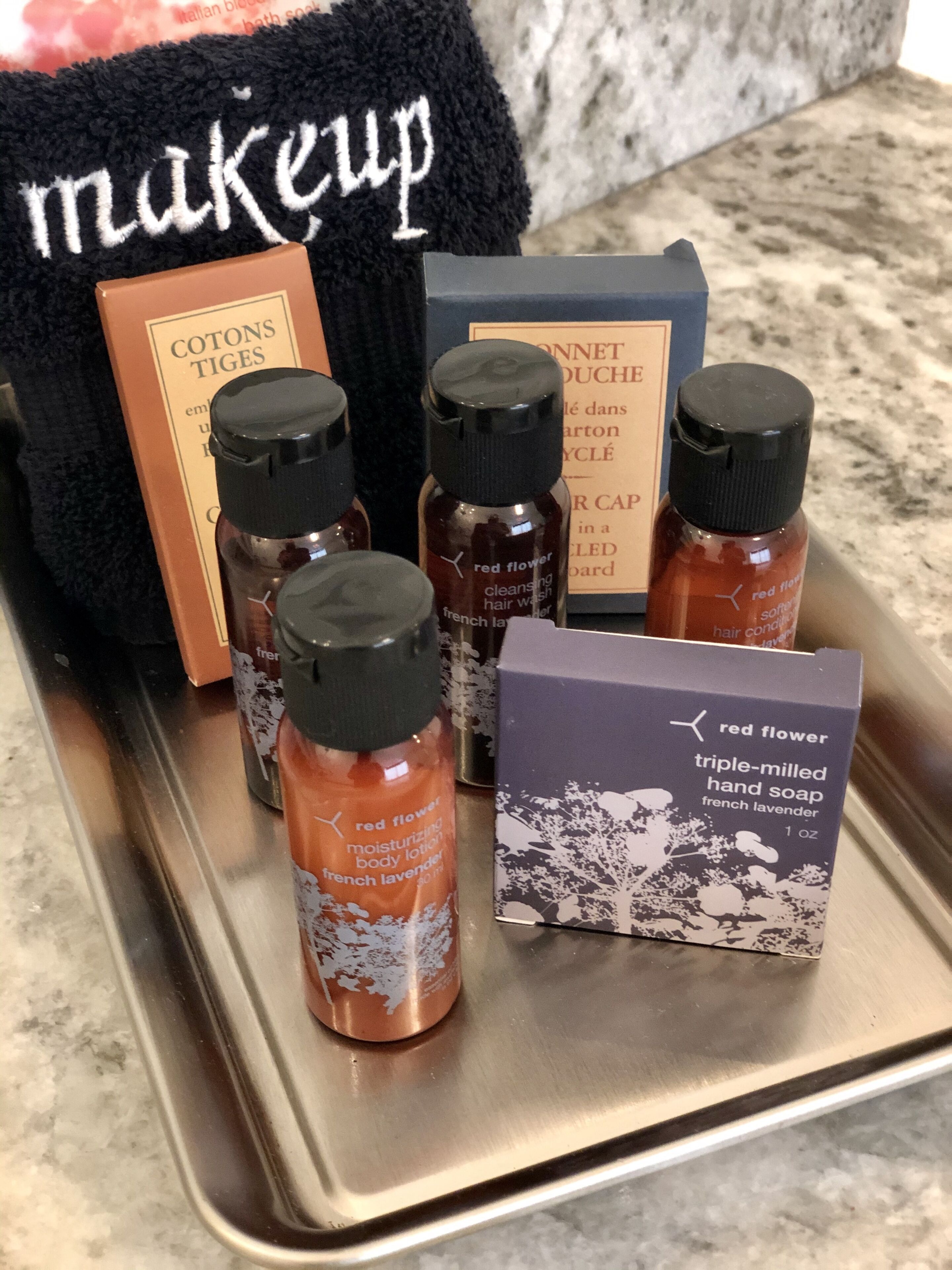 designer toiletries, hair dryer, bathrobes, towels