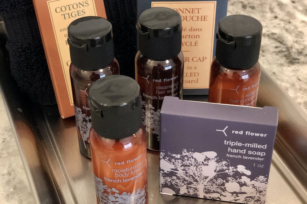 designer toiletries, hair dryer, bathrobes, towels