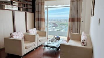 Suite, City View | Minibar, in-room safe, desk, free WiFi