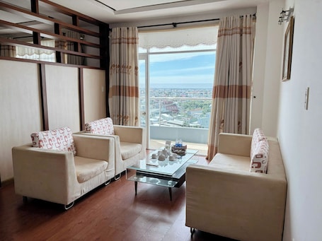 Suite, City View | Minibar, in-room safe, desk, free WiFi