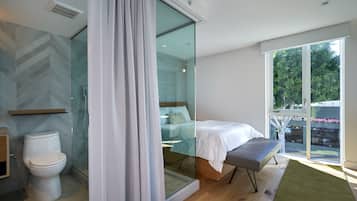 Premium bedding, memory-foam beds, desk, laptop workspace