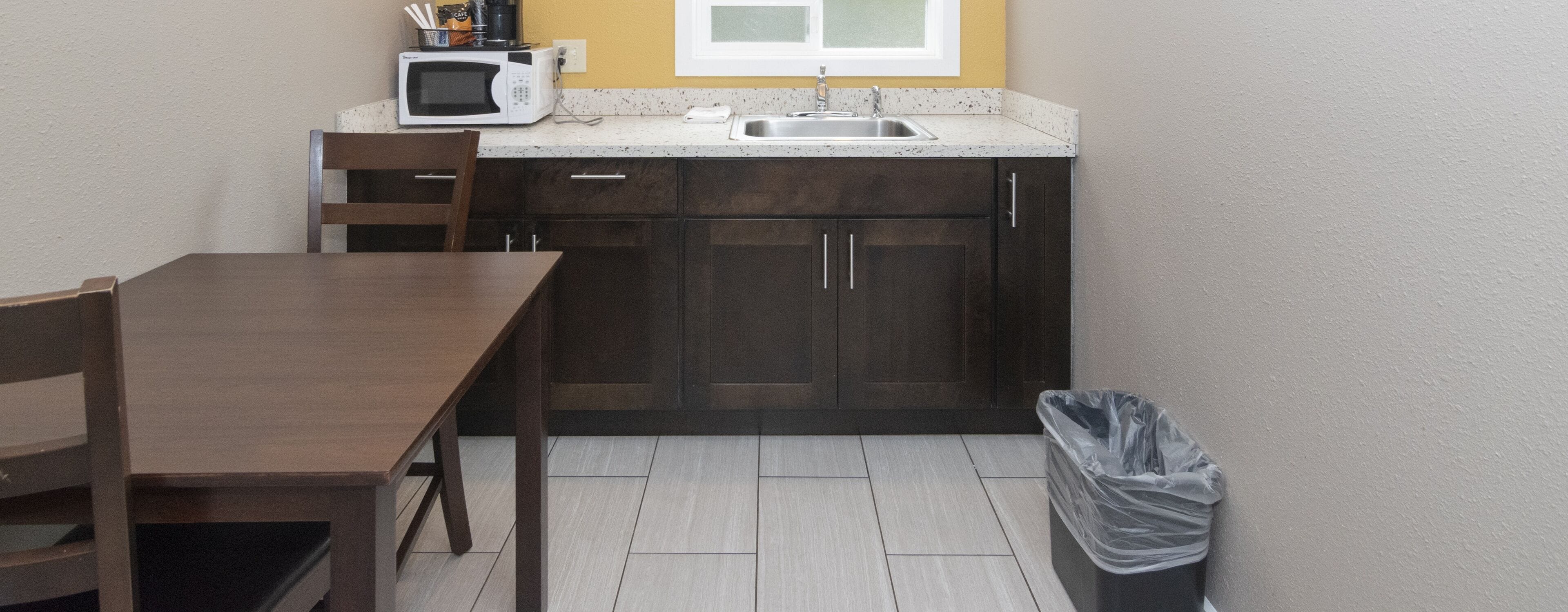 Suite, 2 Queen Beds, Non Smoking | Private kitchen | Fridge, microwave