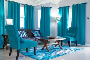 Luxury Villa, 2 Bedrooms, 2 Bathrooms, Courtyard View | Living area | 50-inch flat-screen TV with cable channels, TV, DVD player