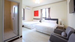 A hotel room with two beds, a TV, a chair, and a window with curtains. - Line In B&B (Jinhu)