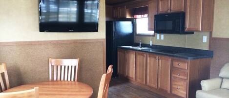 Cottage, 2 bedrooms (No Linens Provided) | Living area | Flat-screen TV