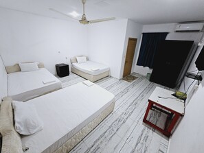 ห้องแฟมิลี่ | โต๊ะทำงาน, ผ้าม่านกันแสง, Wi-Fi ฟรี, ผ้าปูที่นอน