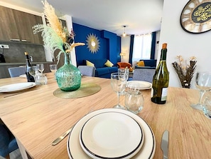 Exclusive Apartment | Living area | 102-cm TV with digital channels, Netflix, streaming services