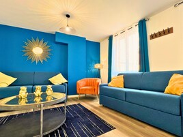 Exclusive Apartment | Living area | 102-cm TV with digital channels, Netflix, streaming services