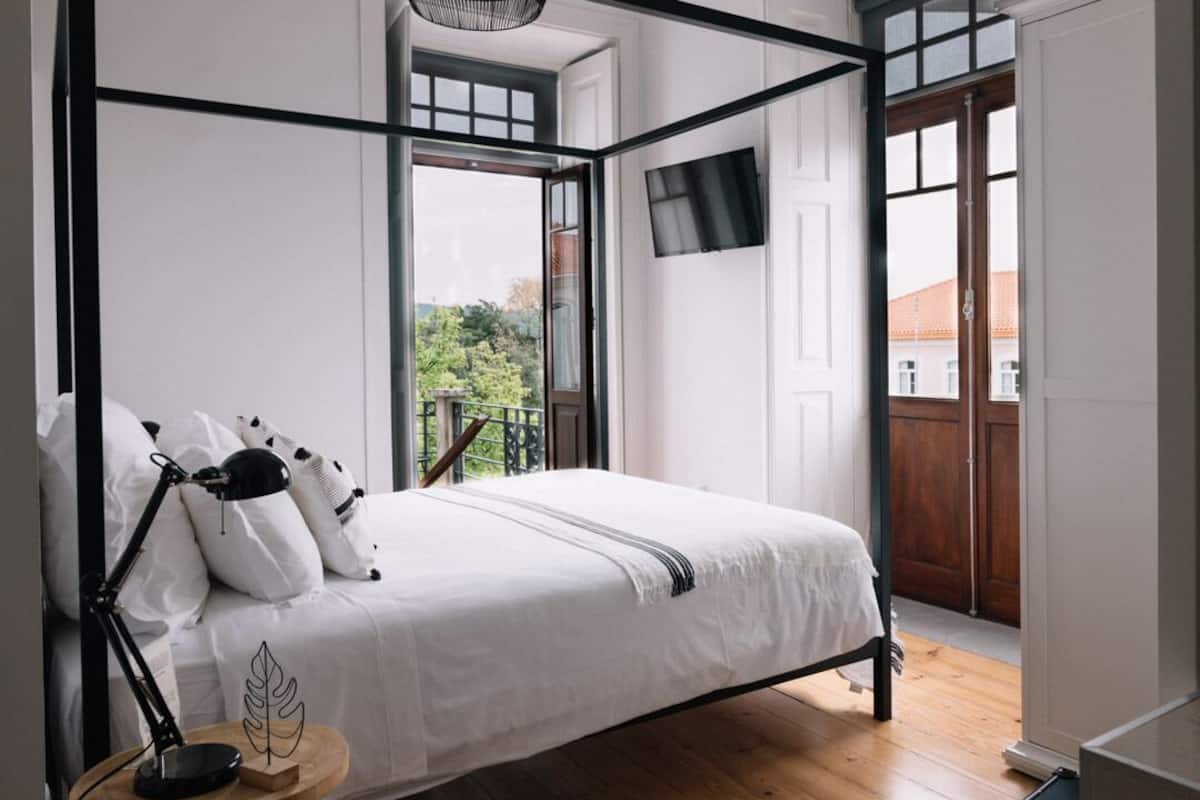 Suite Deluxe, vista città | 1 camera, con stile personalizzato, Wi-Fi gratuito, lenzuola