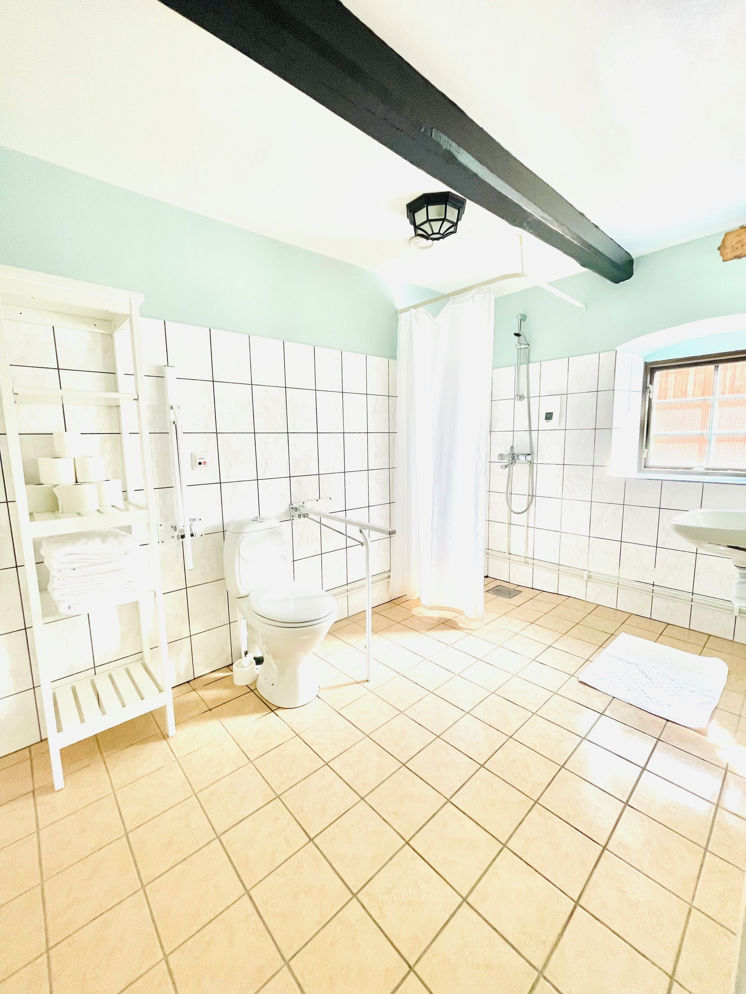 family room | bathroom | shower, hair dryer, towels